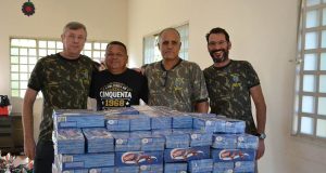 TG-1987 leva Páscoa solidária a 150 crianças Acao solidaria 01