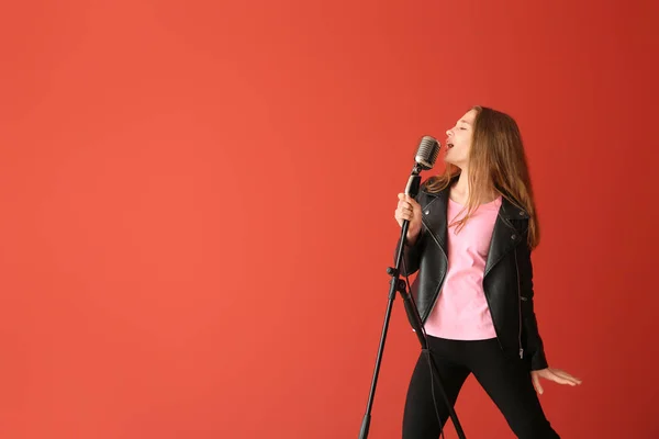 depositphotos_287352350-stock-photo-teenage-girl-with-microphone-singing